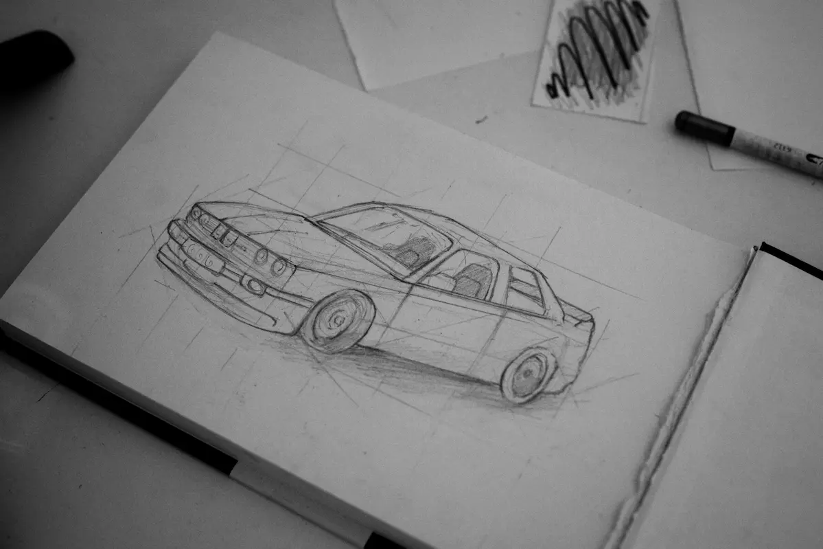 Personas viendo un auto